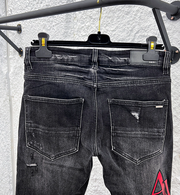 Amiri MX1 Distressed Denim Jeans