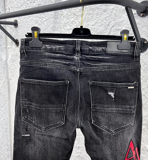 Amiri MX1 Distressed Denim Jeans