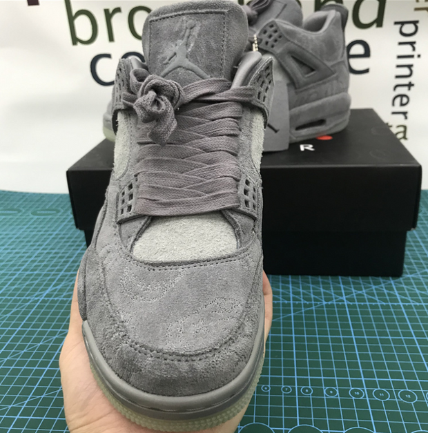 Air Jordan 4 Retro x KAWS “Cool Grey”
