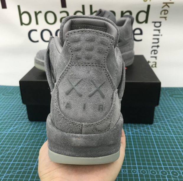 Air Jordan 4 Retro x KAWS “Cool Grey”