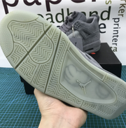 Air Jordan 4 Retro x KAWS “Cool Grey”